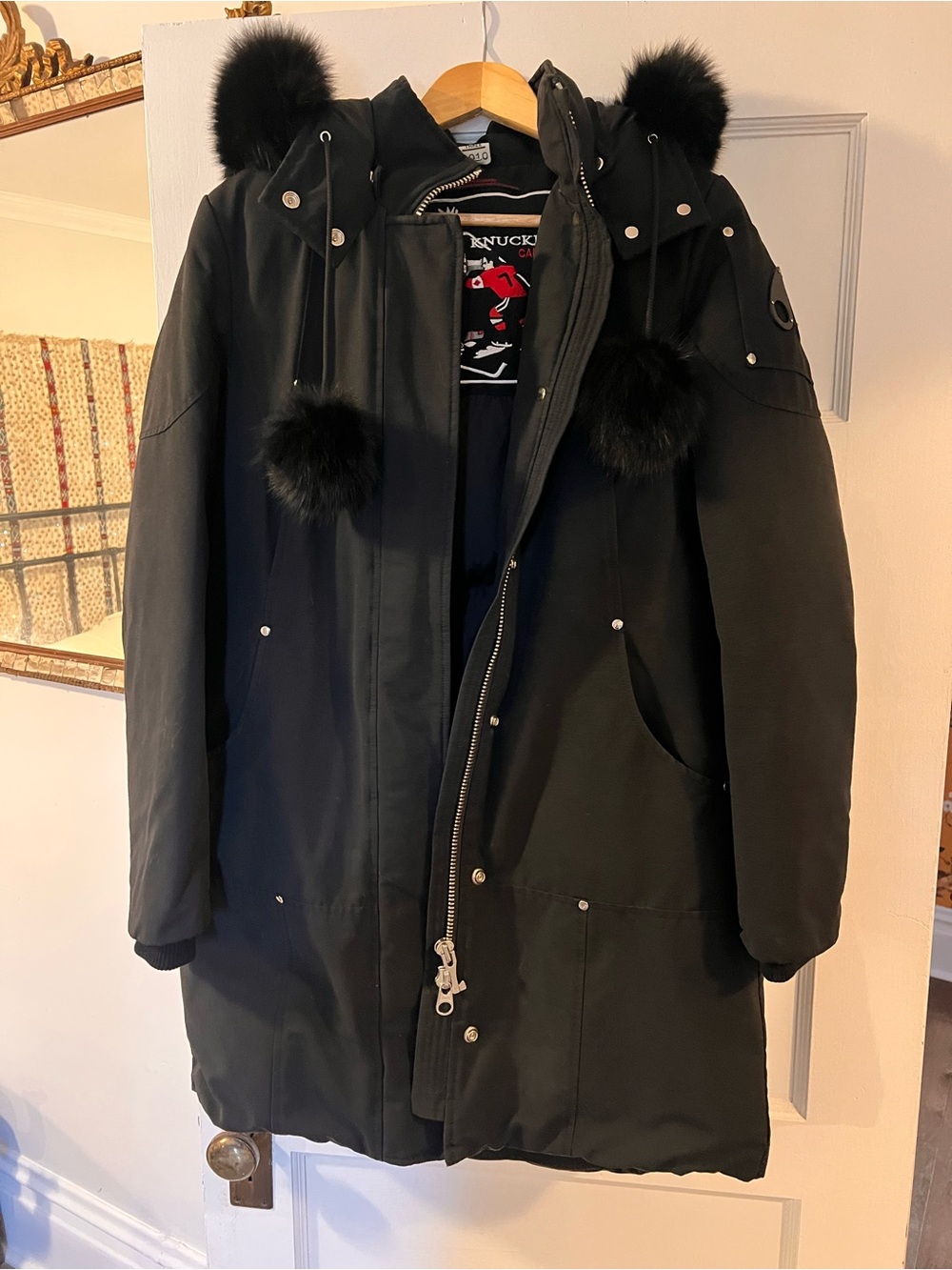 Moose Knuckles Women's Black Long Puffer Parka with Fur Pom-Pom Hood